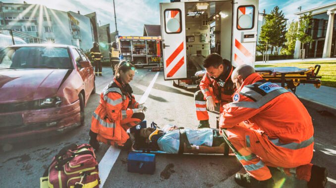 Paramedics providing first aid